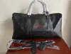 Moda erkek kadın seyahat silindir çanta marka tasarımcısı bagaj çanta kilit ile büyük spor çanta size54CM Çanta Crossbody çanta