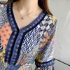 الفساتين غير الرسمية للسيدات الأنيقة رداء البوهيمي الحرير الحرير فستان الأزهار V-neck شاطئ الكشكش مطبوعة عالية الخصر الرجعية