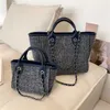 I negozi vendono borse firmate a buon mercato Canvas Colour Contrast Portable for Women 2023 Winter New Large and Small Chain Shoulder