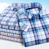 Camisas casuais masculinas camisa xadrez curta de manga curta de meia e jovem pó de peito azul de verão pequeno de verão de verão legal