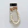 Składane przypadki telefonów komórkowych anty-leadne łańcuch nadgarstka okładka 3D Cartoon twarda obudowa