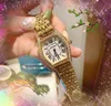 人気のあるアメリカの高級女性ダイヤモンドリング時計トノーシェイプダイヤルクォーツサファイアガラスローマ数字アップグレードカジュアルクールギフト腕時計