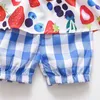 Flickaklänningar sommarfödda baby flickor kläder ärmlös blå jordgubbe tryck romer klänning jumpsuit härlig söt rompers 6-18m