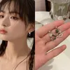 Orecchini posteriori in stile coreano, clip per orecchie a fiore piccolo, senza foro, semplici e carini, scavati, a clip per donne e ragazze con piercing