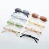 Lunettes de soleil de designer de luxe simples lunettes de designer pour femmes lunettes hommes ornement vintage rectangle sans monture occhiali da sole shades drive travel clear sunglass