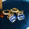 Boucles d'oreilles cerceaux luxe français 14k plaqués or exquis bowknot carré royal bleu zircon pendant tempérament dame oreille de dame