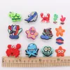 MOQ 20 pièces PVC dessin animé corail crabe étoile de mer poulpe tortue coquille décoration de chaussure charme boucle accessoires sabot broches boutons décorations pour bandes bracelets