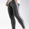 Pantaloni da uomo 2023 Pantaloni da jogging da bodybuilding da uomo Pantaloni sportivi da corsa per fitness casual ad asciugatura rapida Piedi sottili1