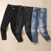 pantaloni jeans firmati pantaloni da uomo in denim caldo addensato slim fit jeans a punta piccola trend casual donne dritte