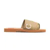 Slippare designer kvinnor woody platta mulor sandaler glider segel canvas vita svarta kvinnor utomhus strand toffel sko