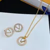 Full Diamant Golden Halskette Kristall Rundkreis Buchstaben Ohrringe Frauen Designer Strass Anhänger Ohrhörer Schmucksets