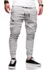 Pantaloni da uomo Tasche a toppa tridimensionali Leggings Pantaloni Uomo Moda Elastico Casual Maschile Stretch Streetwear