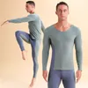 Homens de roupas íntimas térmicas masculinas definem sexy sem costura invisível Johns Winter Fever Cationic Color Matching T-shirts Leggings 2pcs