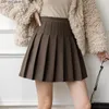 Gonne Gonna di lana invernale Donna Solid Vita alta Pieghettata Mini Vintage School A Line Falda Plisada Beige Grigio Nero Marrone 230110