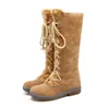 Femmes bottes hautes hiver longues manches chaudes extensibles bretelles croisées bottes hautes givrées avec talon bas.