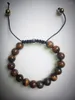 Strand 10mm Tiger Eye Stone Pärlade armband Män Kvinnor Högkvalitativ justerbar rep Handgjorda pärlor armband gåva