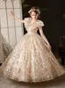 2023 Gold Flower Girl Dresses Jewel Neck Ball Ball Gown Lace Appliques Pärlor Färgglada paljett Kids Girls Pageant Dress Sweep Train Födelsedagsklänningar