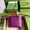 7A Borsa a conchiglia di bambù Borse firmate Borsa a tracolla in vera pelle da donna Fibbia con manico viola Hardware alla moda Lettera Chiusura con cerniera