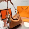 Kova totes çanta şeritler çapraz lüks tasarımcı marka moda omuz çantaları çanta kaliteli kadınlar mektup çanta telefon çantası cüzdan metalik ladys