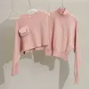 mode lyx varumärke kvinnors tröjor f 2023 tidigt vår ny stickad ficka tvådelar hög krage rosa oregelbundna tröja kvinnor