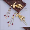 Accessoires pour cheveux Style chinois Phoenix Hairpin Femmes Ornements antiques Étape en métal Balancer des bâtons de gland Rétro Hanfu Drop Livraison Pr Dhcsd