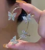 Złote metalowe klipsy do uszu motyla bez przekłuwania dla kobiet błyszczącego cyrkonu klip mankietowy Kolczyki samice biżuterii ślubne 2873292