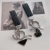 Porte-clés de luxe en alliage de Zinc, marque de styliste, boucle de voiture tendance, fait à la main, pour hommes et femmes, accessoires pendentif de sac
