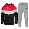 Designer Winter Men's Patchwork tröjor Tracksuits Hooded Sport Lose Long Sleeved Casual Pants Two-Piece Set297a