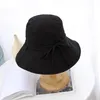 Breda randen hattar och sommarfiskare hatt förhindras Bask i Han Edition Ms Sun Fashion Big Basin längs Jokern