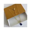 Com designer de caixas clássico de pingente de luxo, mulheres 18k Gold Letter Ring Colar Jewelry Flower Men Pingents Pingents