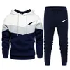 Designer Winter Men's Patchwork tröjor Tracksuits Hooded Sport Lose Long Sleeved Casual Pants Two-Piece Set297a