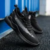 Heren trainers hardloopschoenen zwart wit ademende mode maas joggen comfortabele platte sport sneakers ontwerper chaussures