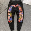 Pantaloni da uomo 2022 Nuovi pantaloni della tuta Baggy Jogging Lettera di moda Hip Hop Streetwear Harem Uomo Casual Pantaloni larghi di cotone T230110