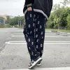 Pantaloni da uomo in stile preppy cranio stampato completo clowstring casual velluroy uomini larghi hip hop dritte dritte pantaloni maschi sciolti 230111