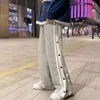 Herrbyxor harajuku breda ben överdimensionerade män streetwear kläder sida split skateboard lösa avslappnade byxor 230111