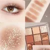 Ombre À Paupières 9 Couleurs Pressées Mat Glitter Palette De Fard À Paupières Professionnel Longue Durée Pigment Diamant Shimmer Terre Brillant Maquillage Goutte Dh0S6