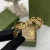 Anneaux de créateurs Mode Sun Flowers Gold Cuff Designer Bijoux pour femmes Bracelet de chaîne de luxe avec collier de pierres précieuses Bague d'amour Mens G 334s