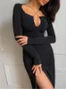 Lässige Kleider Seite Split Black Long Sleeve Party Low geschnittene Verbandkörpern Bodycon Frauenkleid 2023 Spring Sexy Hollow Out Female Vestidos