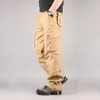 Pantaloni da uomo Tuta multitasche tattica cargo da uomo Pantaloni larghi in cotone da combattimento maschile Pantaloni da lavoro militare dritti