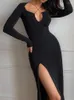 Lässige Kleider Seite Split Black Long Sleeve Party Low geschnittene Verbandkörpern Bodycon Frauenkleid 2023 Spring Sexy Hollow Out Female Vestidos