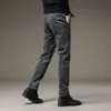 Męskie spodnie zimowe polarowe ciepłe sztrukoi mężczyźni rozciągnij gęste elastyczne talia puch puchowe koreańskie klasyczne brązowe spodnie brązowe ubranie marki 230111