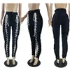 Leggings voor dames sexy gat bandage kwast broek vrouwen uitgeholde zwarte randbroek club feestje trekkoord stropdas front lang