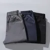 Pantalons pour hommes automne hommes Stretch coréen décontracté Slim Fit taille élastique survêtement affaires classique pantalon mâle noir gris bleu 28-38 230111