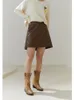 スカートDushu Cool Style Leather Skirt Women Earty auther High WAIST THIN CASUAROL SOLID COLOR MINI 230110