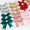 Décorations de Noël 50pcs 85 * 85mm ruban de satin rose arcs décoration paquets cadeaux petits arcs de fleurs pour artisanat arc de mariage naissance bricolage décoration de fête