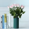 Flores decorativas 10pcs sentem rosa broto de flores hidratante artificial para casamento caseiro