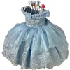 2023 Robes de filles de fleur bleu clair pour les mariages hors épaule bretelles spaghetti faites à la main fleur anniversaire enfants tulle fille pageant robes longueur de plancher