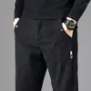 Pantalones para hombres Otoño 2023 Pantalones de chándal suaves elásticos rectos ajustados Edición coreana informal para hombres Pantalones negros sueltos cepillados para jóvenes