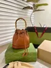 Heuptas designer lederen handtas voor onderweg mm Bamboo mini Tote bag Glanzende antieke goudkleurige accessoires accessoires Gloednieuwe vorm bamboe bucket bag