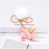 Keychains lanyards pluizige pompom faux konijn fur ball glitter 26 letters bloem sleutel ringen ketens houder juwelentas accessoires gi dhf9k